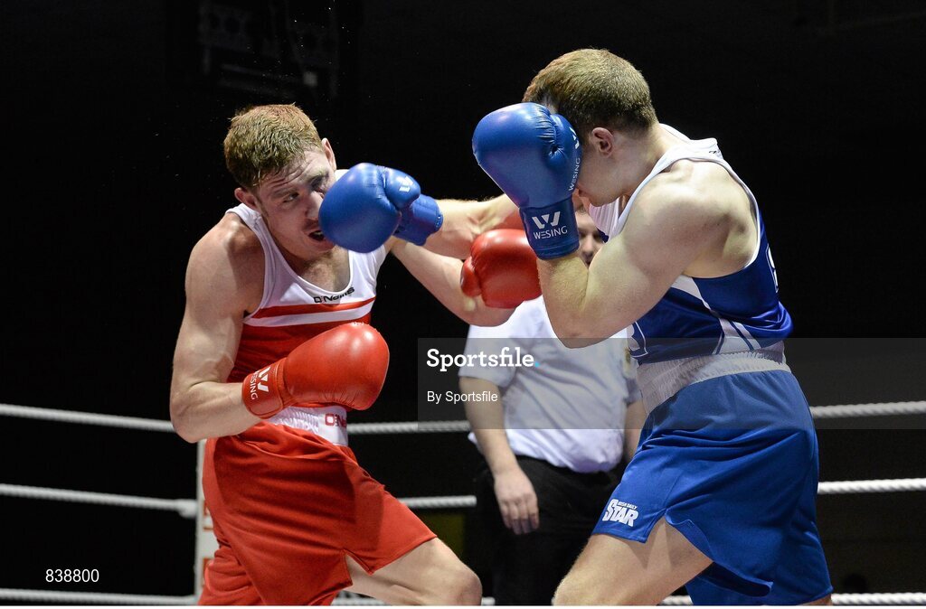 1 March 2014; Donal Ward, right, Loughglynn Boxing Club, exchanges punches with Matthew Tinker, St Francis Boxing Club, during their 81 kg bout. National Senior Boxing Championships Semi Finals, National Stadium, Dublin. Photo by Sportsfile