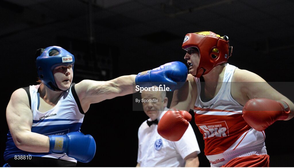 1 March 2014; Lianne McAree-Murphy, left, Carrickmacross Boxing Club, exchanges punches with Fionna Nelson, City of Belfast Boxing Club, during their 81+ kg bout. National Senior Boxing Championships Semi Finals, National Stadium, Dublin. Photo by Sportsfile