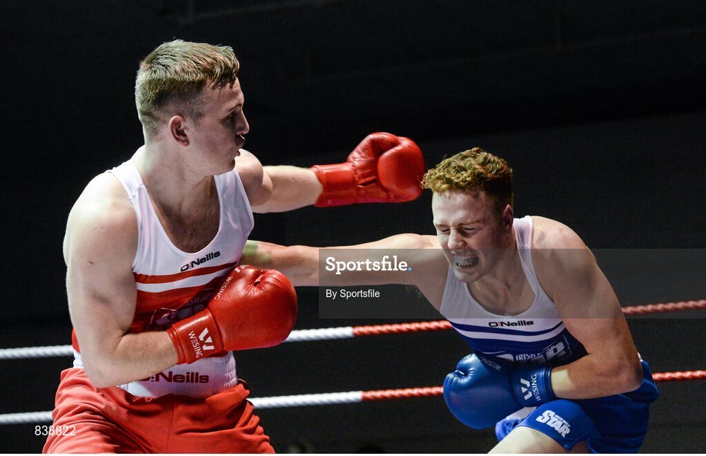 1 March 2014; Bernard O’Reilly, right, Portlaoise Boxing Club, exchanges punches with Gary Sweeny, Olympic Boxing Club, during their 91 kg bout. National Senior Boxing Championships Semi Finals, National Stadium, Dublin. Photo by Sportsfile