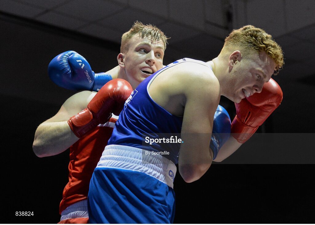 1 March 2014; Gary Sweeny, left, Olympic Boxing Club, exchanges punches with Bernard O’Reilly, Portlaoise Boxing Club, during their 91 kg bout. National Senior Boxing Championships Semi Finals, National Stadium, Dublin. Photo by Sportsfile