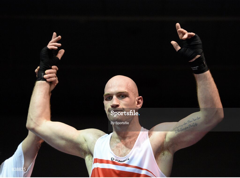 1 March 2014; Stephen Ward, Monkstown Boxing Club, celebrates as he is declared the winner over Krys Sikora, St Francis Boxing Club, following their 91 kg bout. National Senior Boxing Championships Semi Finals, National Stadium, Dublin. Photo by Sportsfile