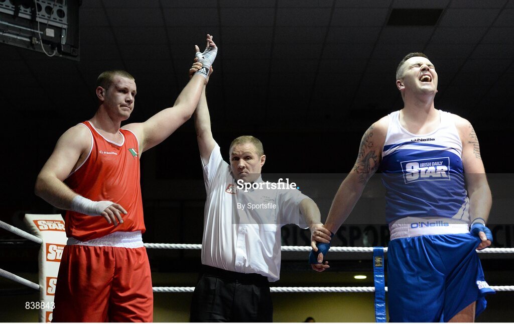 1 March 2014; Con Sheehan, left, Clonmel Boxing Club, is declared the winner over Niall Kennedy, Gorey Boxing Club, following their 91+ kg bout. National Senior Boxing Championships Semi Finals, National Stadium, Dublin. Photo by Sportsfile