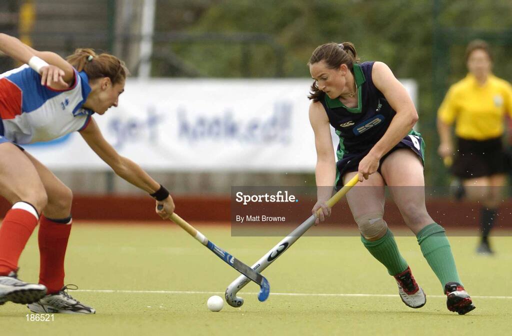 14 August 2005; Eimer Cregan, Ireland, in action against Peggy Bergere, France. 7th Women's European Nations Hockey Championship, Pool A, Ireland v France, Belfield, UCD, Dublin. Picture credit; Matt Browne / SPORTSFILE