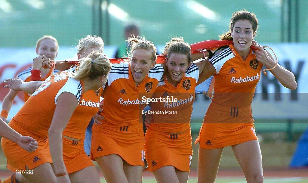 20 August 2005; Dutch players, from right, Naomi Van As, Ellen Hoog, Leonoor Voskamp celebrate with team-mates Sophie Polkamp and Kim Lammers, left, after victory over Germany. 7th Women's European Nations Hockey Championship Final, Germany v Netherlands, Belfield, UCD, Dublin. Picture credit; Brendan Moran / SPORTSFILE