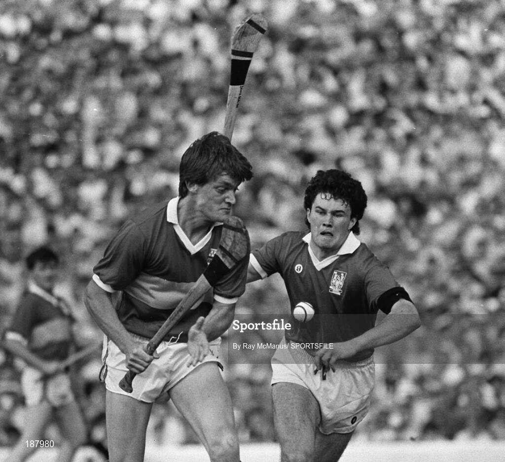 19 July 1987; Nicky English, Tipperary, is tackled by Dennis Walsh, Cork. Munster Hurling Final Replay, Tipperary v Cork, Fitzgerald Stadium, Killarney, Kerry. Picture credit; Ray McManus / SPORTSFILE