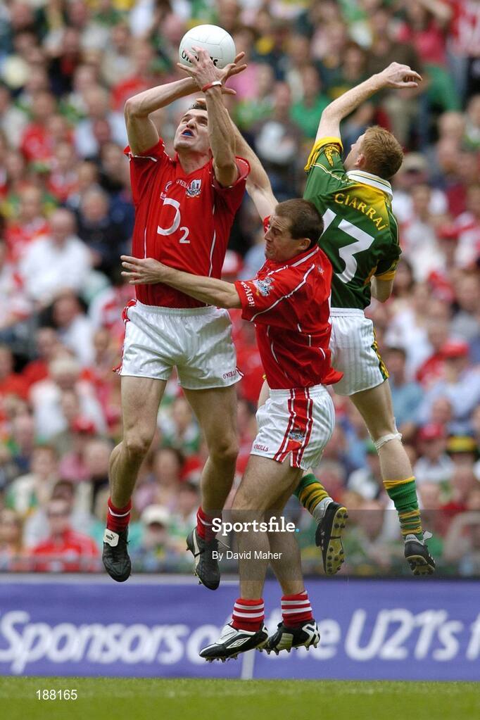 28 August 2005; Graham Canty, left and Niall Geary, Cork, contest an aerial ball with Colm Cooper, Kerry. Bank of Ireland All-Ireland Senior Football Championship Semi-Final, Kerry v Cork, Croke Park, Dublin. Picture credit; David Maher / SPORTSFILE