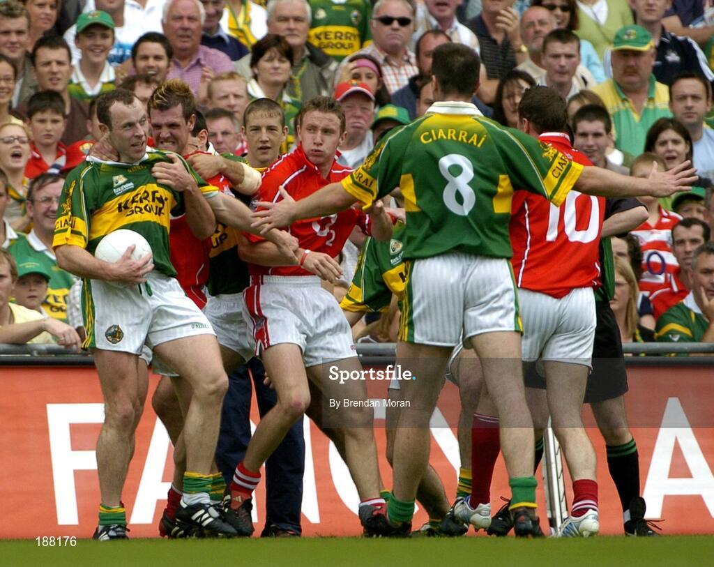 28 August 2005; Brendan Jer O'Sullivan, 2nd from left, Cork, gets to grips with Seamus Moynihan, Kerry. Bank of Ireland All-Ireland Senior Football Championship Semi-Final, Kerry v Cork, Croke Park, Dublin. Picture credit; Brendan Moran / SPORTSFILE