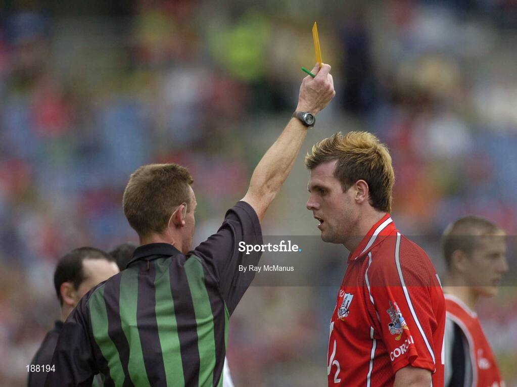 28 August 2005; Brendan Jer O'Sullivan, Cork, is shown the 'yellow card' by referee Joe McQuillan. Bank of Ireland All-Ireland Senior Football Championship Semi-Final, Kerry v Cork, Croke Park, Dublin. Picture credit; Ray McManus / SPORTSFILE