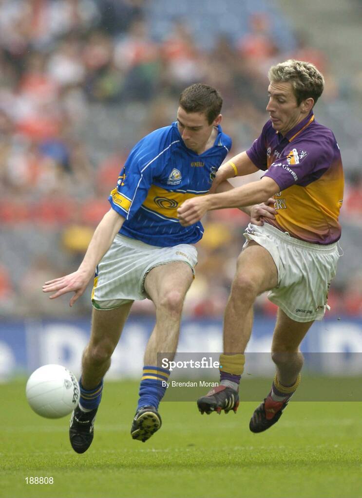 4 September 2005; Robbie Costigan, Tipperary, in action against Redmond Barry, Wexford. Tommy Murphy Cup Final, Wexford v Tipperary, Croke Park, Dublin. Picture credit; Brendan Moran / SPORTSFILE
