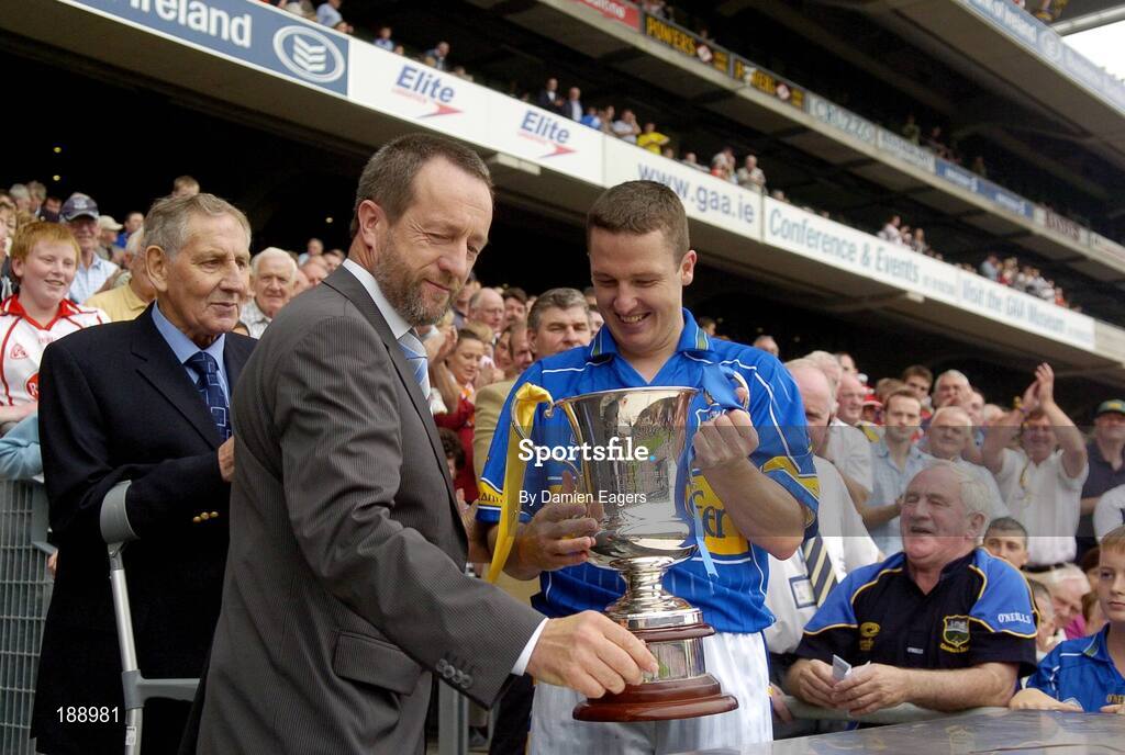 4 September 2005; Declan Browne, Tipperary captain receives the Tommy Murphy Cup from Sean Kelly, President of the GAA. Tommy Murphy Cup Final, Wexford v Tipperary, Croke Park, Dublin. Picture credit; Damien Eagers / SPORTSFILE