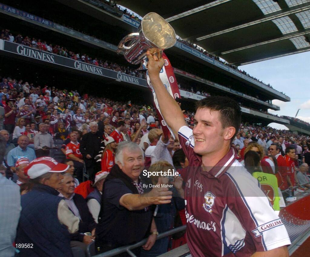 11 September 2005; Galway minor captain Andrew Keary celebrates with the Irish Press Cup at the end of the game. ESB All-Ireland Minor Hurling Championship Final, Galway v Limerick, Croke Park, Dublin. Picture credit; David Maher / SPORTSFILE