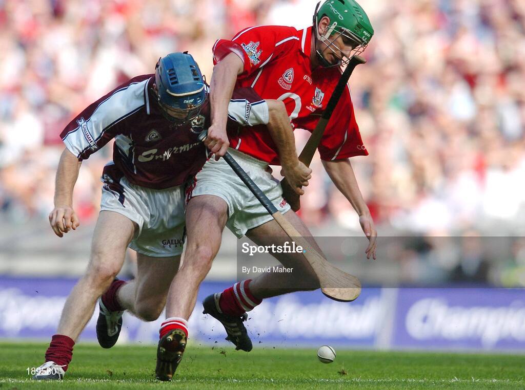 11 September 2005; Brian Murphy, Cork, in action against Damien Hayes, Galway. Guinness All-Ireland Senior Hurling Championship Final, Galway v Cork, Croke Park, Dublin. Picture credit; David Maher / SPORTSFILE *** Local Caption *** Any photograph taken by SPORTSFILE during, or in connection with, the 2005 Guinness All-Ireland Hurling Final which displays GAA logos or contains an image or part of an image of any GAA intellectual property, or, which contains images of a GAA player/players in their playing uniforms, may only be used for editorial and non-advertising purposes.  Use of photographs for advertising, as posters or for purchase separately is strictly prohibited unless prior written approval has been obtained from the Gaelic Athletic Association.