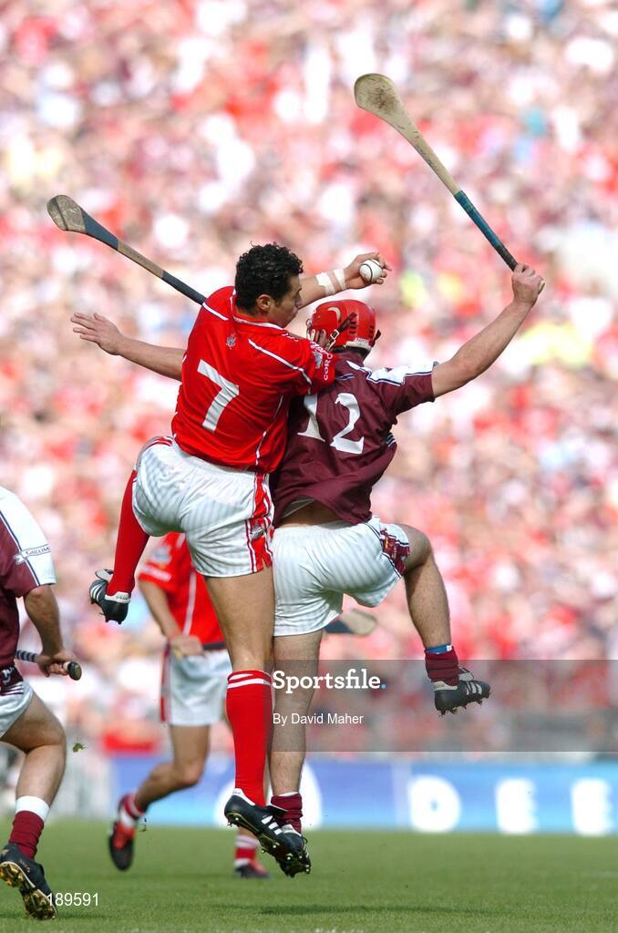 11 September 2005; Sean Og O hAilpin, Cork, wins an aerial ball against Alan Kerins, Galway. Guinness All-Ireland Senior Hurling Championship Final, Galway v Cork, Croke Park, Dublin. Picture credit; David Maher / SPORTSFILE *** Local Caption *** Any photograph taken by SPORTSFILE during, or in connection with, the 2005 Guinness All-Ireland Hurling Final which displays GAA logos or contains an image or part of an image of any GAA intellectual property, or, which contains images of a GAA player/players in their playing uniforms, may only be used for editorial and non-advertising purposes.  Use of photographs for advertising, as posters or for purchase separately is strictly prohibited unless prior written approval has been obtained from the Gaelic Athletic Association.