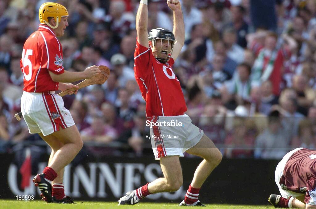 11 September 2005; Ben O'Connor of Cork celebrates his goal with team-mate Joe Deane, left, during the Guinness All-Ireland Senior Hurling Championship Final match between Galway and Cork at Croke Park in Dublin. Photo by Ray McManus/Sportsfile *** Local Caption *** Any photograph taken by SPORTSFILE during, or in connection with, the 2005 Guinness All-Ireland Hurling Final which displays GAA logos or contains an image or part of an image of any GAA intellectual property, or, which contains images of a GAA player/players in their playing uniforms, may only be used for editorial and non-advertising purposes.  Use of photographs for advertising, as posters or for purchase separately is strictly prohibited unless prior written approval has been obtained from the Gaelic Athletic Association.