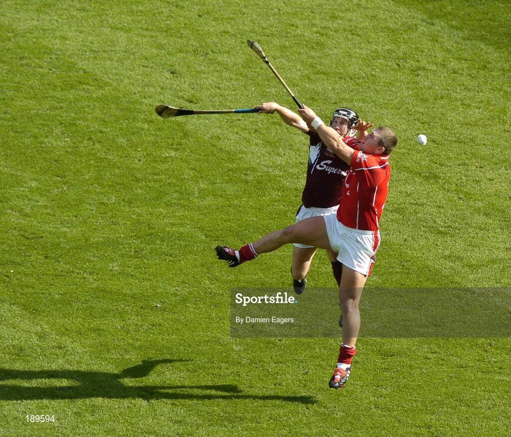 11 September 2005; Niall Healy, Galway, in action against Diarmuid O'Sullivan, Cork. Guinness All-Ireland Senior Hurling Championship Final, Galway v Cork, Croke Park, Dublin. Picture credit; Damien Eagers / SPORTSFILE *** Local Caption *** Any photograph taken by SPORTSFILE during, or in connection with, the 2005 Guinness All-Ireland Hurling Final which displays GAA logos or contains an image or part of an image of any GAA intellectual property, or, which contains images of a GAA player/players in their playing uniforms, may only be used for editorial and non-advertising purposes.  Use of photographs for advertising, as posters or for purchase separately is strictly prohibited unless prior written approval has been obtained from the Gaelic Athletic Association.