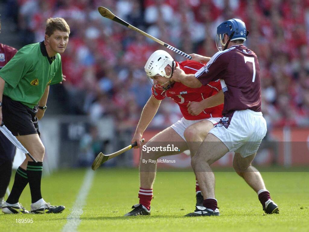 11 September 2005; Timmy McCarthy, Cork, in action against David Collins, Galway. Guinness All-Ireland Senior Hurling Championship Final, Galway v Cork, Croke Park, Dublin. Picture credit; Ray McManus / SPORTSFILE *** Local Caption *** Any photograph taken by SPORTSFILE during, or in connection with, the 2005 Guinness All-Ireland Hurling Final which displays GAA logos or contains an image or part of an image of any GAA intellectual property, or, which contains images of a GAA player/players in their playing uniforms, may only be used for editorial and non-advertising purposes.  Use of photographs for advertising, as posters or for purchase separately is strictly prohibited unless prior written approval has been obtained from the Gaelic Athletic Association.