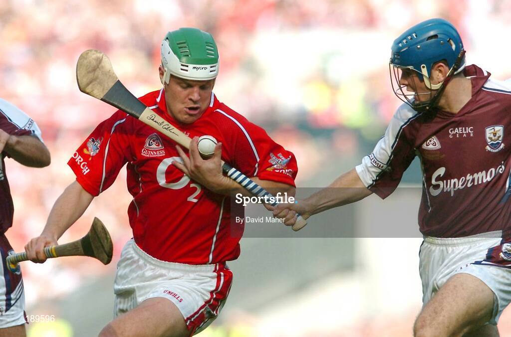 11 September 2005; Niall McCarthy, Cork, in action against David Collins, Galway. Guinness All-Ireland Senior Hurling Championship Final, Galway v Cork, Croke Park, Dublin. Picture credit; David Maher / SPORTSFILE *** Local Caption *** Any photograph taken by SPORTSFILE during, or in connection with, the 2005 Guinness All-Ireland Hurling Final which displays GAA logos or contains an image or part of an image of any GAA intellectual property, or, which contains images of a GAA player/players in their playing uniforms, may only be used for editorial and non-advertising purposes.  Use of photographs for advertising, as posters or for purchase separately is strictly prohibited unless prior written approval has been obtained from the Gaelic Athletic Association.