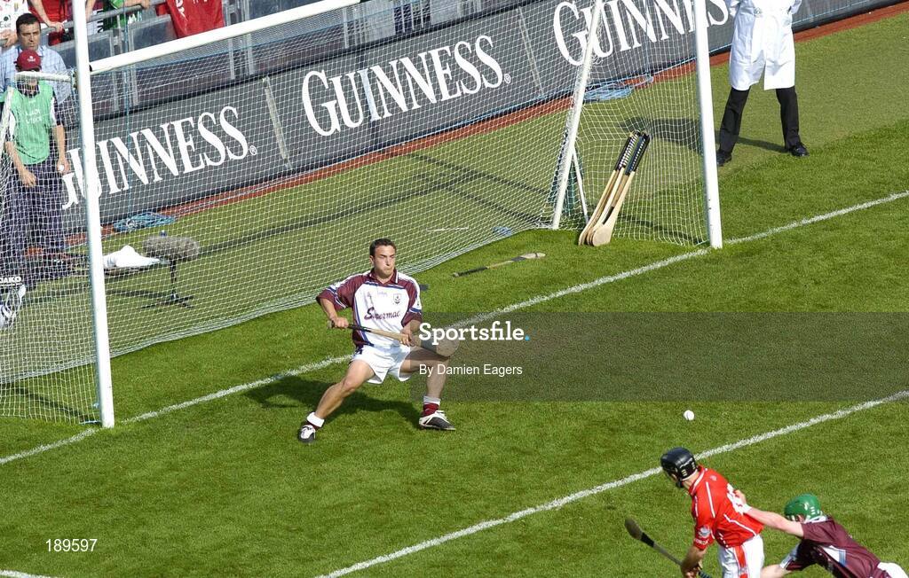 11 September 2005; Cork's Ben O'Connor shoots past Galway goalkeeper Liam Donoghue to score his sides opening goal. Guinness All-Ireland Senior Hurling Championship Final, Galway v Cork, Croke Park, Dublin. Picture credit; Damien Eagers / SPORTSFILE *** Local Caption *** Any photograph taken by SPORTSFILE during, or in connection with, the 2005 Guinness All-Ireland Hurling Final which displays GAA logos or contains an image or part of an image of any GAA intellectual property, or, which contains images of a GAA player/players in their playing uniforms, may only be used for editorial and non-advertising purposes.  Use of photographs for advertising, as posters or for purchase separately is strictly prohibited unless prior written approval has been obtained from the Gaelic Athletic Association.