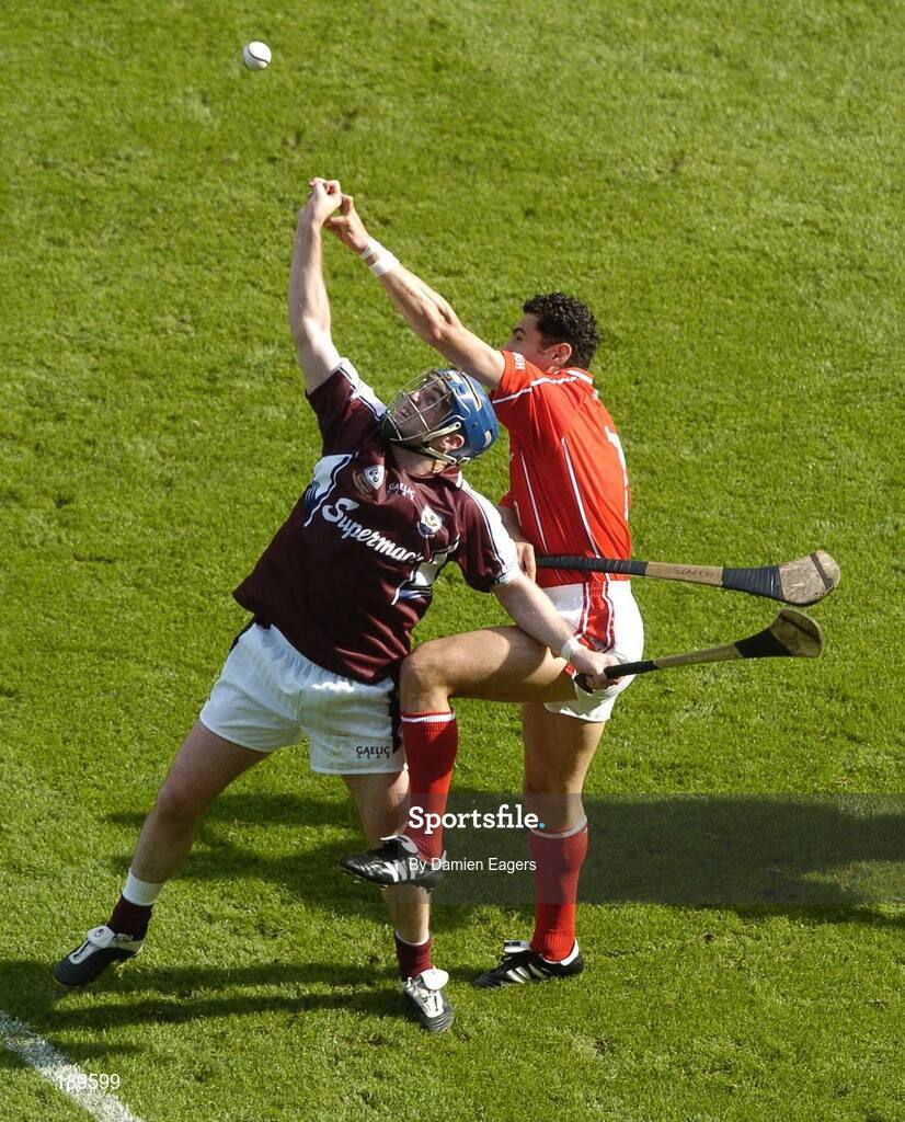 11 September 2005; David Forde, Galway, contests a high ball with Sean Og O'hAilpin, Cork. Guinness All-Ireland Senior Hurling Championship Final, Galway v Cork, Croke Park, Dublin. Picture credit; Damien Eagers / SPORTSFILE *** Local Caption *** Any photograph taken by SPORTSFILE during, or in connection with, the 2005 Guinness All-Ireland Hurling Final which displays GAA logos or contains an image or part of an image of any GAA intellectual property, or, which contains images of a GAA player/players in their playing uniforms, may only be used for editorial and non-advertising purposes.  Use of photographs for advertising, as posters or for purchase separately is strictly prohibited unless prior written approval has been obtained from the Gaelic Athletic Association.