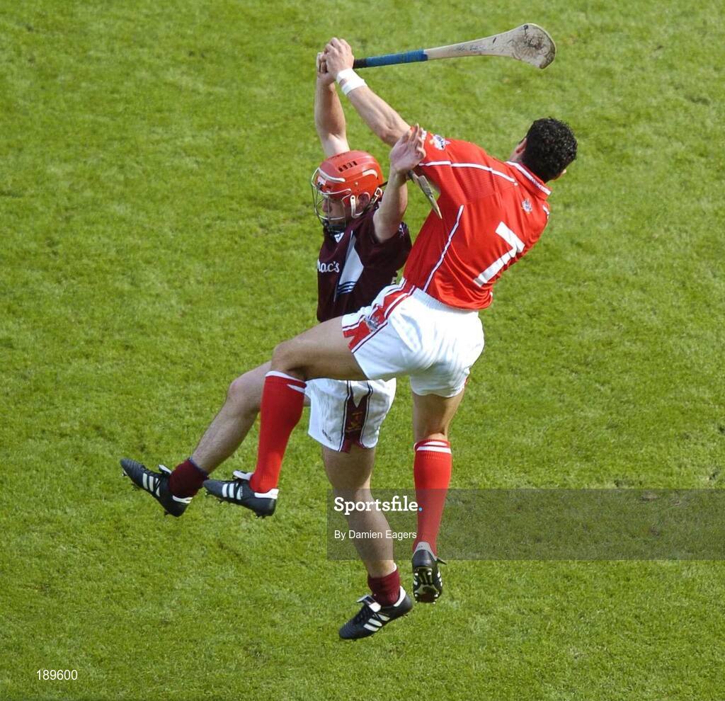 11 September 2005; Sean Og O'hAilpin, Cork, catches the sliothar above Galway's Alan Kerins. Guinness All-Ireland Senior Hurling Championship Final, Galway v Cork, Croke Park, Dublin. Picture credit; Damien Eagers / SPORTSFILE *** Local Caption *** Any photograph taken by SPORTSFILE during, or in connection with, the 2005 Guinness All-Ireland Hurling Final which displays GAA logos or contains an image or part of an image of any GAA intellectual property, or, which contains images of a GAA player/players in their playing uniforms, may only be used for editorial and non-advertising purposes.  Use of photographs for advertising, as posters or for purchase separately is strictly prohibited unless prior written approval has been obtained from the Gaelic Athletic Association.