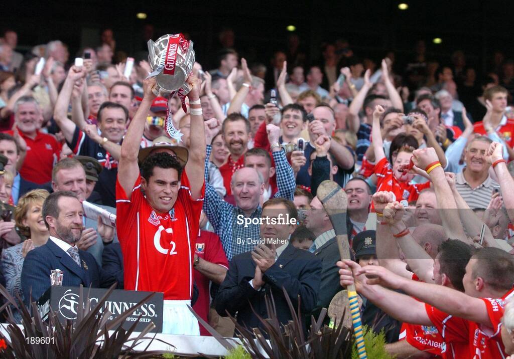 11 September 2005; Cork captain Sean Og O hAilpin lifts the Liam MacCarthy Cup. Guinness All-Ireland Senior Hurling Championship Final, Galway v Cork, Croke Park, Dublin. Picture credit; David Maher / SPORTSFILE *** Local Caption *** Any photograph taken by SPORTSFILE during, or in connection with, the 2005 Guinness All-Ireland Hurling Final which displays GAA logos or contains an image or part of an image of any GAA intellectual property, or, which contains images of a GAA player/players in their playing uniforms, may only be used for editorial and non-advertising purposes.  Use of photographs for advertising, as posters or for purchase separately is strictly prohibited unless prior written approval has been obtained from the Gaelic Athletic Association.