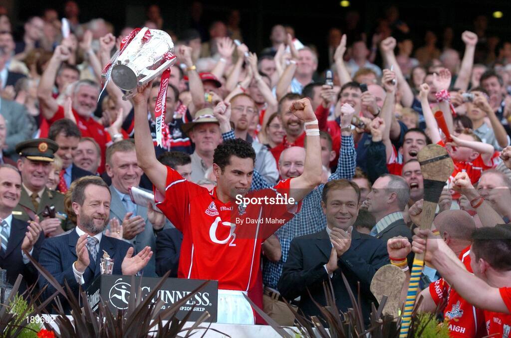 11 September 2005; Cork captain Sean Og O hAilpin lifts the Liam MacCarthy cup. Guinness All-Ireland Senior Hurling Championship Final, Galway v Cork, Croke Park, Dublin. Picture credit; David Maher / SPORTSFILE *** Local Caption *** Any photograph taken by SPORTSFILE during, or in connection with, the 2005 Guinness All-Ireland Hurling Final which displays GAA logos or contains an image or part of an image of any GAA intellectual property, or, which contains images of a GAA player/players in their playing uniforms, may only be used for editorial and non-advertising purposes.  Use of photographs for advertising, as posters or for purchase separately is strictly prohibited unless prior written approval has been obtained from the Gaelic Athletic Association.