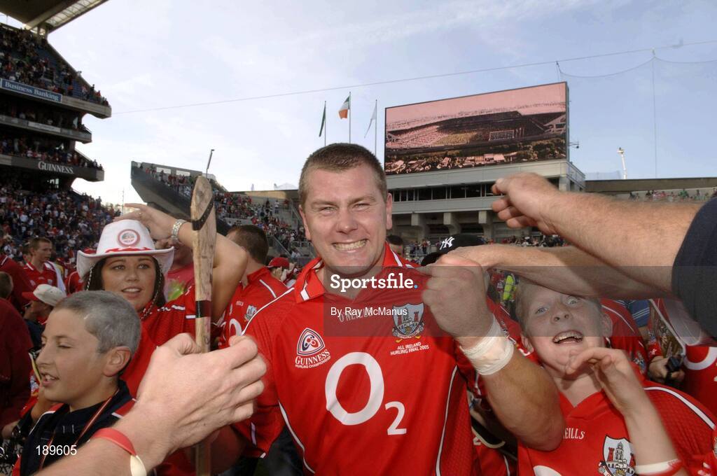 11 September 2005; Diarmuid O'Sullivan, Cork, celebrates victory at the end of the game. Guinness All-Ireland Senior Hurling Championship Final, Galway v Cork, Croke Park, Dublin. Picture credit; Ray McManus / SPORTSFILE *** Local Caption *** Any photograph taken by SPORTSFILE during, or in connection with, the 2005 Guinness All-Ireland Hurling Final which displays GAA logos or contains an image or part of an image of any GAA intellectual property, or, which contains images of a GAA player/players in their playing uniforms, may only be used for editorial and non-advertising purposes.  Use of photographs for advertising, as posters or for purchase separately is strictly prohibited unless prior written approval has been obtained from the Gaelic Athletic Association.