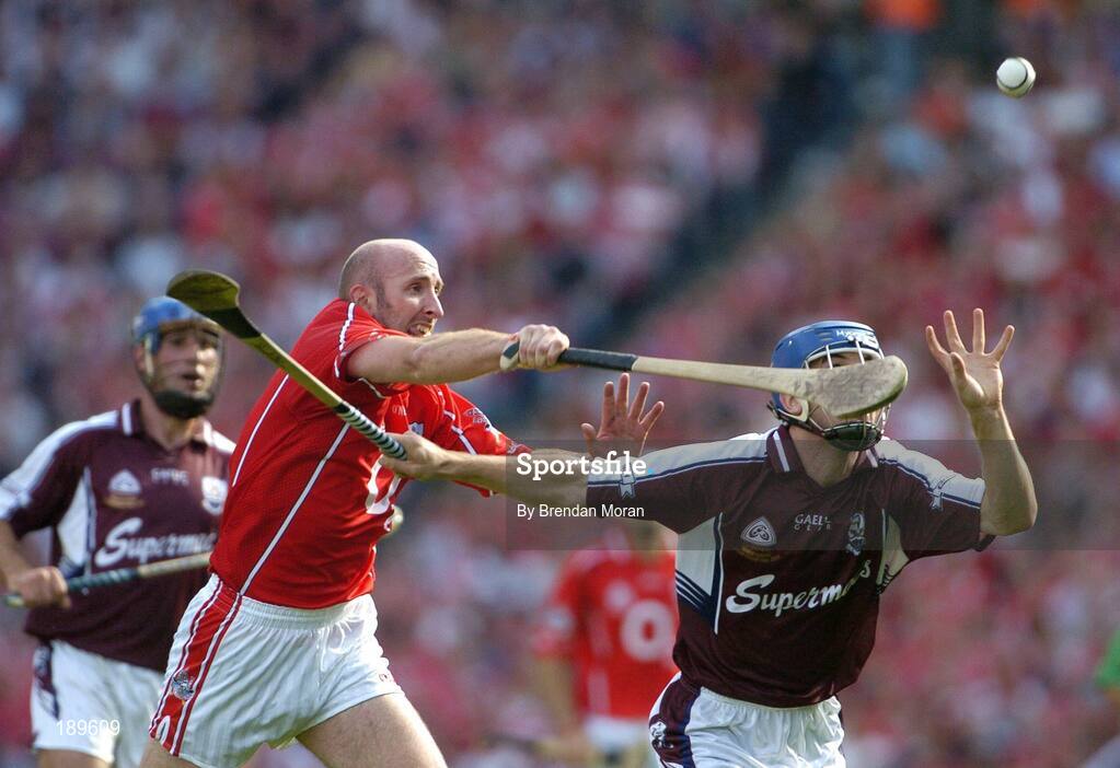 11 September 2005; David Collins, Galway, in action against Brian Corcoran, Cork. Guinness All-Ireland Senior Hurling Championship Final, Galway v Cork, Croke Park, Dublin. Picture credit; Brendan Moran / SPORTSFILE *** Local Caption *** Any photograph taken by SPORTSFILE during, or in connection with, the 2005 Guinness All-Ireland Hurling Final which displays GAA logos or contains an image or part of an image of any GAA intellectual property, or, which contains images of a GAA player/players in their playing uniforms, may only be used for editorial and non-advertising purposes.  Use of photographs for advertising, as posters or for purchase separately is strictly prohibited unless prior written approval has been obtained from the Gaelic Athletic Association.