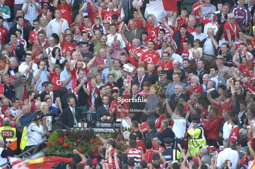 11 September 2005; Sean Og O hAilpin, Cork, lifts the Liam MacCarthy Cup. Guinness All-Ireland Senior Hurling Championship Final, Galway v Cork, Croke Park, Dublin. Picture credit; Ray McManus / SPORTSFILE *** Local Caption *** Any photograph taken by SPORTSFILE during, or in connection with, the 2005 Guinness All-Ireland Hurling Final which displays GAA logos or contains an image or part of an image of any GAA intellectual property, or, which contains images of a GAA player/players in their playing uniforms, may only be used for editorial and non-advertising purposes.  Use of photographs for advertising, as posters or for purchase separately is strictly prohibited unless prior written approval has been obtained from the Gaelic Athletic Association.
