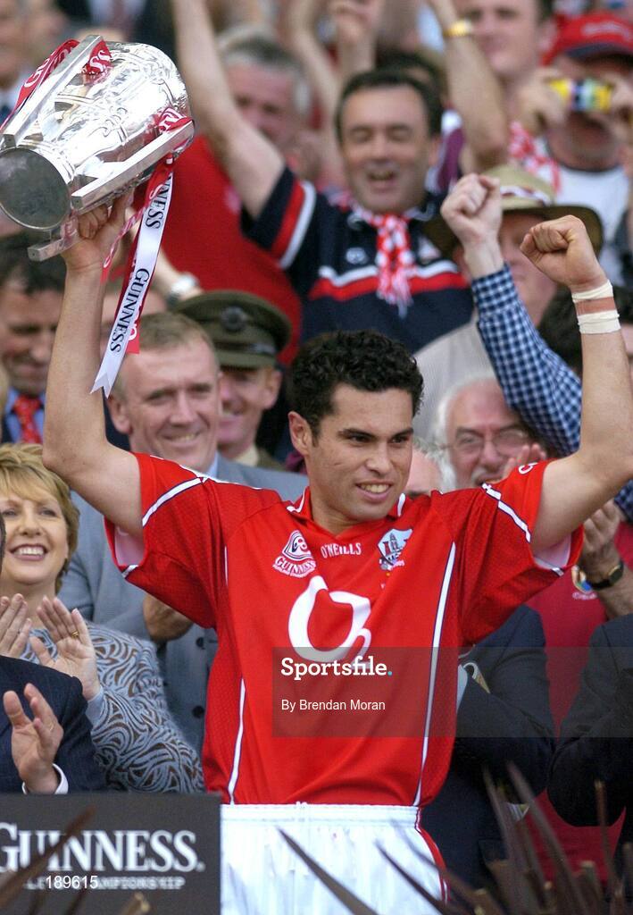 11 September 2005; The Cork captain Sean Og O hAilpin lifts the Liam MacCarthy Cup. Guinness All-Ireland Senior Hurling Championship Final, Galway v Cork, Croke Park, Dublin. Picture credit; Brendan Moran / SPORTSFILE *** Local Caption *** Any photograph taken by SPORTSFILE during, or in connection with, the 2005 Guinness All-Ireland Hurling Final which displays GAA logos or contains an image or part of an image of any GAA intellectual property, or, which contains images of a GAA player/players in their playing uniforms, may only be used for editorial and non-advertising purposes.  Use of photographs for advertising, as posters or for purchase separately is strictly prohibited unless prior written approval has been obtained from the Gaelic Athletic Association.