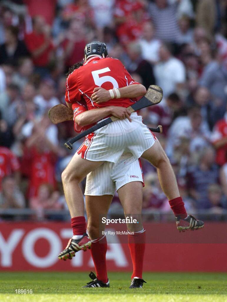 11 September 2005; Cork players Sean Og O hAilpin and John Gardnier, 5, celebrate victory. Guinness All-Ireland Senior Hurling Championship Final, Galway v Cork, Croke Park, Dublin. Picture credit; Ray McManus / SPORTSFILE *** Local Caption *** Any photograph taken by SPORTSFILE during, or in connection with, the 2005 Guinness All-Ireland Hurling Final which displays GAA logos or contains an image or part of an image of any GAA intellectual property, or, which contains images of a GAA player/players in their playing uniforms, may only be used for editorial and non-advertising purposes.  Use of photographs for advertising, as posters or for purchase separately is strictly prohibited unless prior written approval has been obtained from the Gaelic Athletic Association.