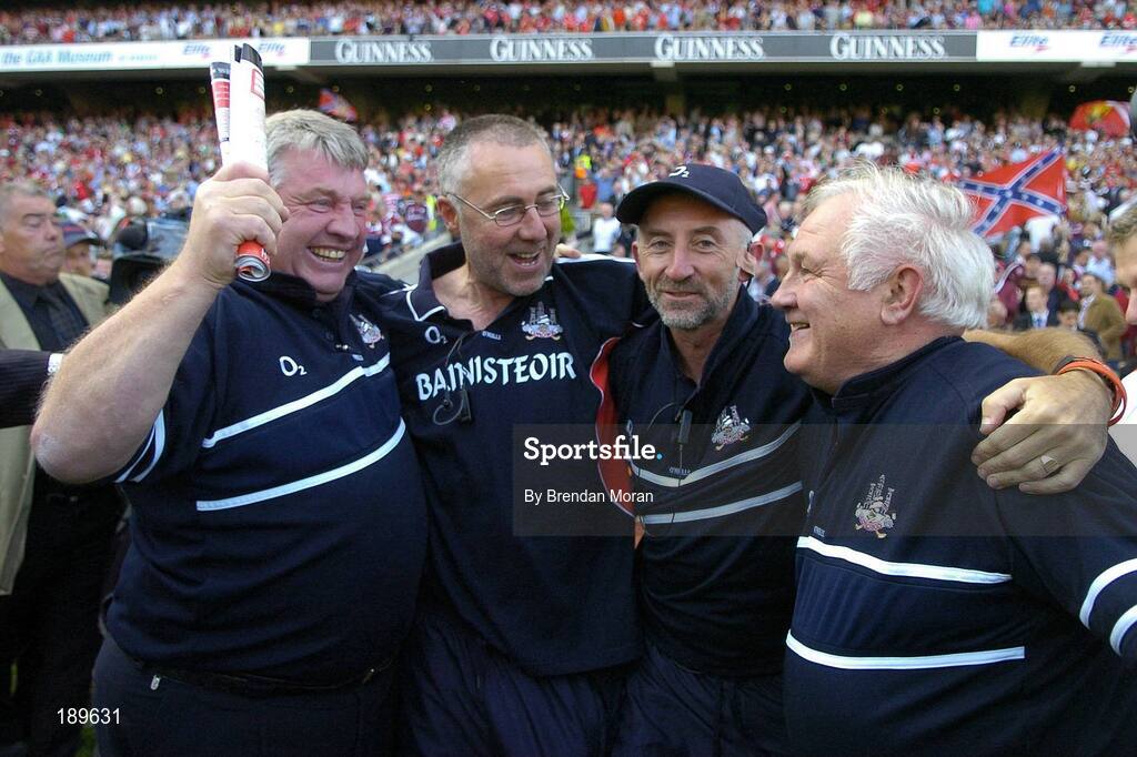11 September 2005; Members of the Cork management, from left, Patsy Morrissey, selector, John Allen, manager, Joe O'Leary, selector and Fred Sheedy, selector, celebrate after the final whistle. Guinness All-Ireland Senior Hurling Championship Final, Galway v Cork, Croke Park, Dublin. Picture credit; Brendan Moran / SPORTSFILE *** Local Caption *** Any photograph taken by SPORTSFILE during, or in connection with, the 2005 Guinness All-Ireland Hurling Final which displays GAA logos or contains an image or part of an image of any GAA intellectual property, or, which contains images of a GAA player/players in their playing uniforms, may only be used for editorial and non-advertising purposes.  Use of photographs for advertising, as posters or for purchase separately is strictly prohibited unless prior written approval has been obtained from the Gaelic Athletic Association.