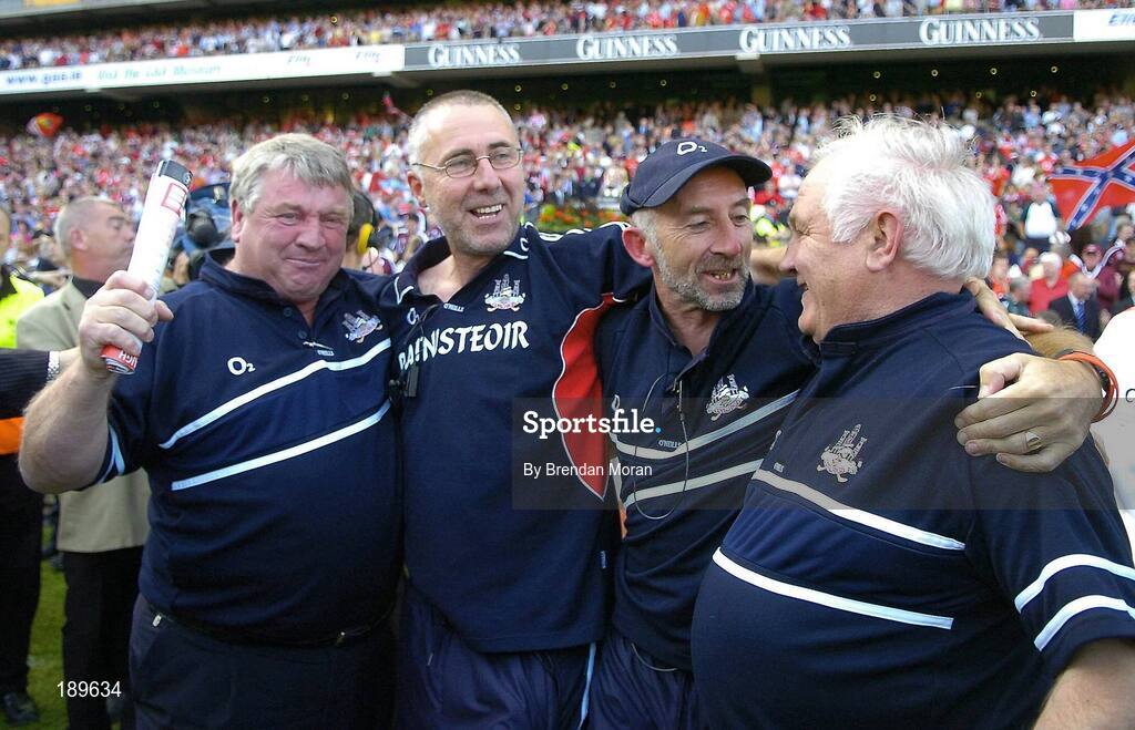 11 September 2005; Members of the Cork management, from left, Patsy Morrissey, selector, John Allen, manager, Joe O'Leary, selector and Fred Sheedy, selector, celebrate after the final whistle. Guinness All-Ireland Senior Hurling Championship Final, Galway v Cork, Croke Park, Dublin. Picture credit; Brendan Moran / SPORTSFILE *** Local Caption *** Any photograph taken by SPORTSFILE during, or in connection with, the 2005 Guinness All-Ireland Hurling Final which displays GAA logos or contains an image or part of an image of any GAA intellectual property, or, which contains images of a GAA player/players in their playing uniforms, may only be used for editorial and non-advertising purposes.  Use of photographs for advertising, as posters or for purchase separately is strictly prohibited unless prior written approval has been obtained from the Gaelic Athletic Association.