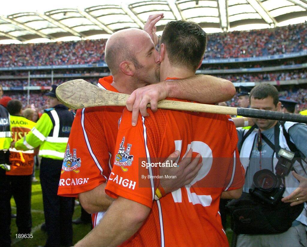 11 September 2005; Cork's Brian Corcoran kisses team-mate Timmy MacCarthy after the final whistle. Guinness All-Ireland Senior Hurling Championship Final, Galway v Cork, Croke Park, Dublin. Picture credit; Brendan Moran / SPORTSFILE *** Local Caption *** Any photograph taken by SPORTSFILE during, or in connection with, the 2005 Guinness All-Ireland Hurling Final which displays GAA logos or contains an image or part of an image of any GAA intellectual property, or, which contains images of a GAA player/players in their playing uniforms, may only be used for editorial and non-advertising purposes.  Use of photographs for advertising, as posters or for purchase separately is strictly prohibited unless prior written approval has been obtained from the Gaelic Athletic Association.