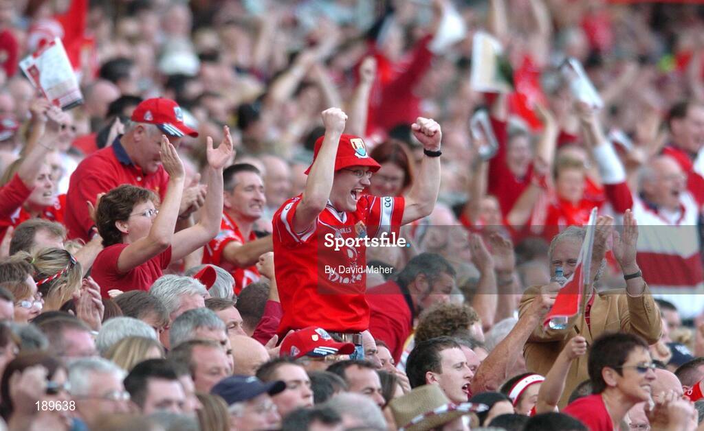 11 September 2005; Cork supporters cheer on their team during the game. Guinness All-Ireland Senior Hurling Championship Final, Galway v Cork, Croke Park, Dublin. Picture credit; David Maher / SPORTSFILE *** Local Caption *** Any photograph taken by SPORTSFILE during, or in connection with, the 2005 Guinness All-Ireland Hurling Final which displays GAA logos or contains an image or part of an image of any GAA intellectual property, or, which contains images of a GAA player/players in their playing uniforms, may only be used for editorial and non-advertising purposes.  Use of photographs for advertising, as posters or for purchase separately is strictly prohibited unless prior written approval has been obtained from the Gaelic Athletic Association.