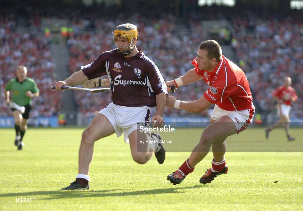 11 September 2005; Ger Farragher, Galway, in action against Diarmuid O'Sullivan, Cork. Guinness All-Ireland Senior Hurling Championship Final, Galway v Cork, Croke Park, Dublin. Picture credit; Ray McManus / SPORTSFILE *** Local Caption *** Any photograph taken by SPORTSFILE during, or in connection with, the 2005 Guinness All-Ireland Hurling Final which displays GAA logos or contains an image or part of an image of any GAA intellectual property, or, which contains images of a GAA player/players in their playing uniforms, may only be used for editorial and non-advertising purposes.  Use of photographs for advertising, as posters or for purchase separately is strictly prohibited unless prior written approval has been obtained from the Gaelic Athletic Association.