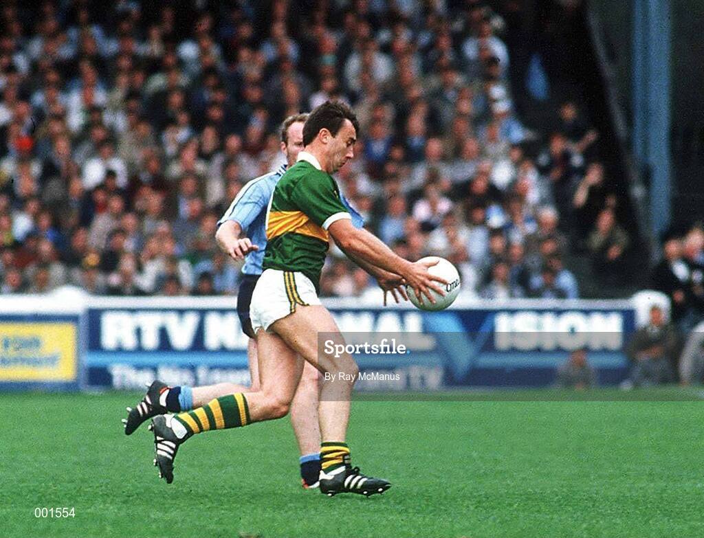 22 September 1985; Denis 'Ogie' Moran of Kerry in action against Noel Caffrey of Dublin during the All Ireland Football Championship Final match between Kerry and Dublin at Croke Park, Dublin. Photo by Ray McManus/Sportsfile