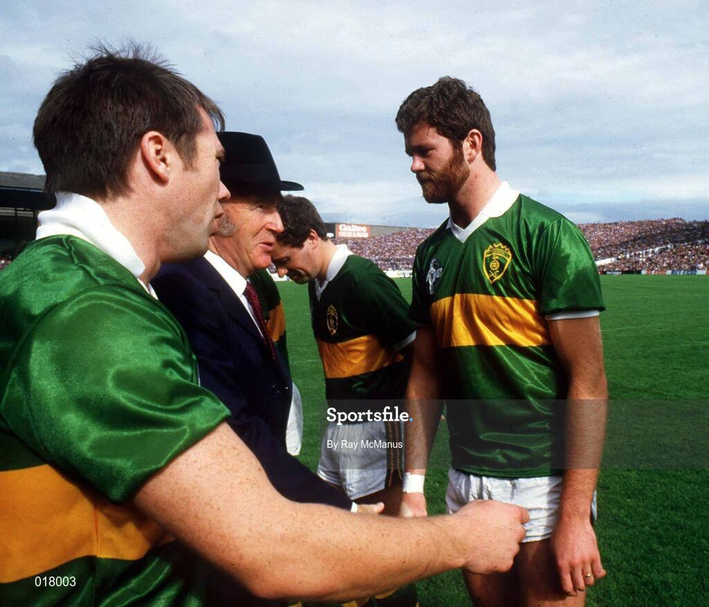 22 September 1985; Kerry captain Páidí Ó Sé introduces President of Ireland Patrick Hillery to Kerry full forward Eoin "Bomber" Liston before the All Ireland Football Championship Final match between Kerry and Dublin at Croke Park, Dublin. Photo by Ray McManus/Sportsfile