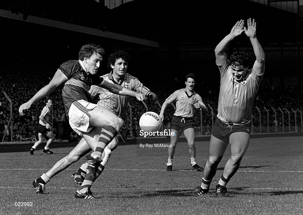 22 September 1985; Pat Spillane of Kerry in action against Joe McNally of Dublin during the All Ireland Football Championship Final match between Kerry and Dublin at Croke Park, Dublin. Photo by Ray McManus/Sportsfile