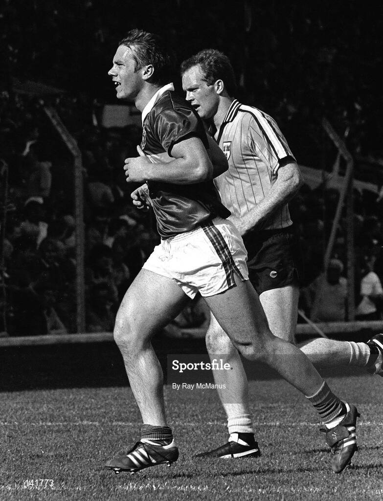 22 September 1985; Páidí Ó Sé of Kerry, with Barney Rock of Dublin during the All Ireland Football Championship Final match between Kerry and Dublin at Croke Park, Dublin. Photo by Ray McManus/Sportsfile