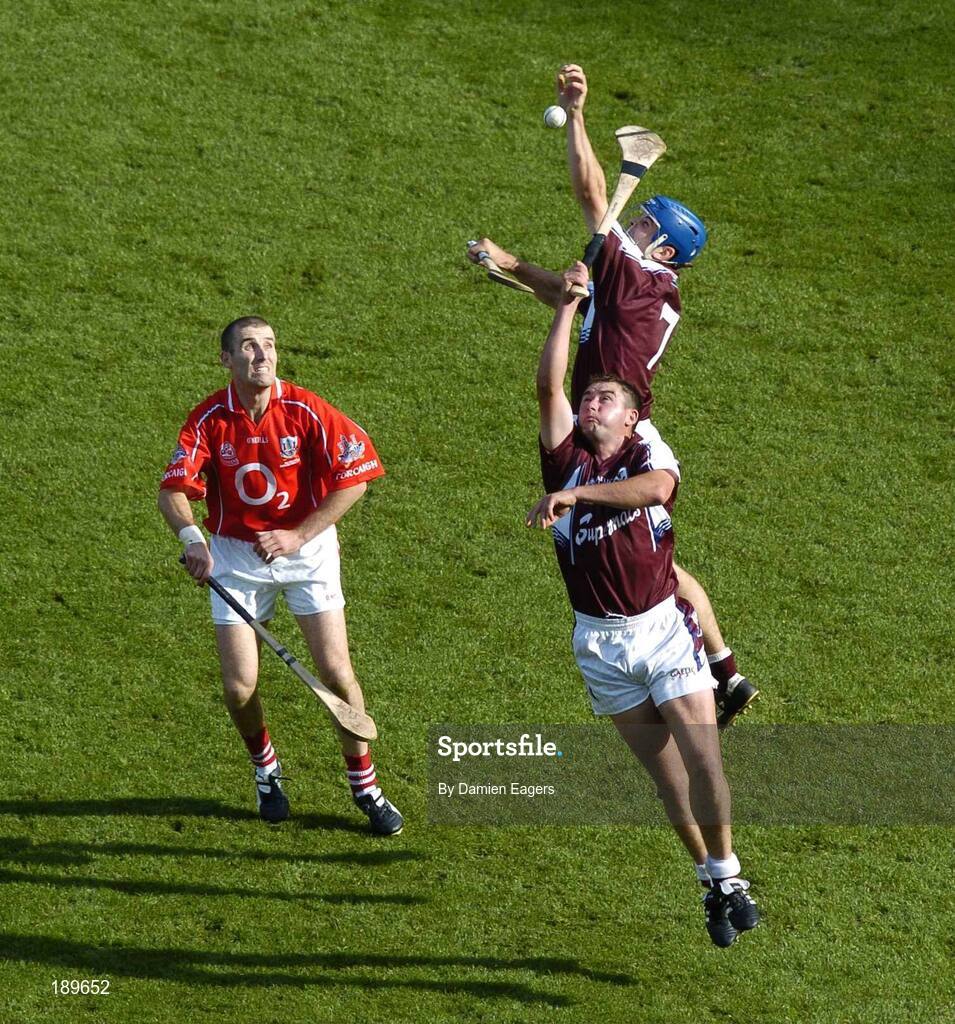 11 September 2005; David Collins, (7) and Derick Hardiman, Galway, in action against Ben O'Connor, Cork. Guinness All-Ireland Senior Hurling Championship Final, Galway v Cork, Croke Park, Dublin. Picture credit; Damien Eagers / SPORTSFILE *** Local Caption *** Any photograph taken by SPORTSFILE during, or in connection with, the 2005 Guinness All-Ireland Hurling Final which displays GAA logos or contains an image or part of an image of any GAA intellectual property, or, which contains images of a GAA player/players in their playing uniforms, may only be used for editorial and non-advertising purposes.  Use of photographs for advertising, as posters or for purchase separately is strictly prohibited unless prior written approval has been obtained from the Gaelic Athletic Association.