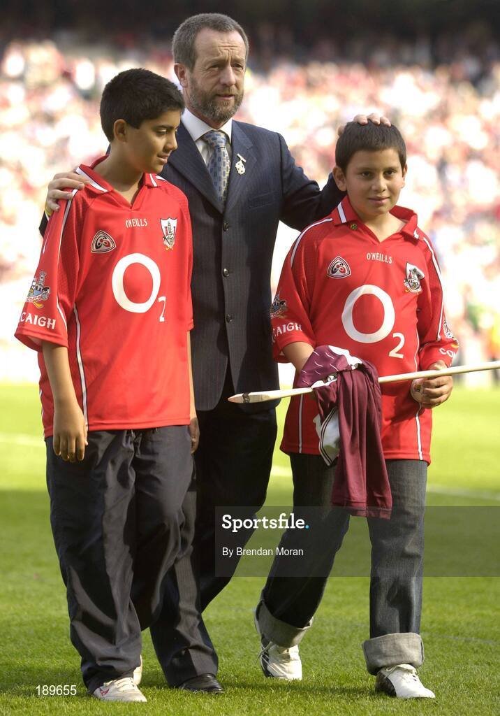 11 September 2005; GAA president Sean Kelly with Ben Healy Mahalingham, left, and Georgy Farniyev, who is a survivor of the Beslan school massacre one year ago. Guinness All-Ireland Senior Hurling Championship Final, Galway v Cork, Croke Park, Dublin. Picture credit; Brendan Moran / SPORTSFILE *** Local Caption *** Any photograph taken by SPORTSFILE during, or in connection with, the 2005 Guinness All-Ireland Hurling Final which displays GAA logos or contains an image or part of an image of any GAA intellectual property, or, which contains images of a GAA player/players in their playing uniforms, may only be used for editorial and non-advertising purposes.  Use of photographs for advertising, as posters or for purchase separately is strictly prohibited unless prior written approval has been obtained from the Gaelic Athletic Association.