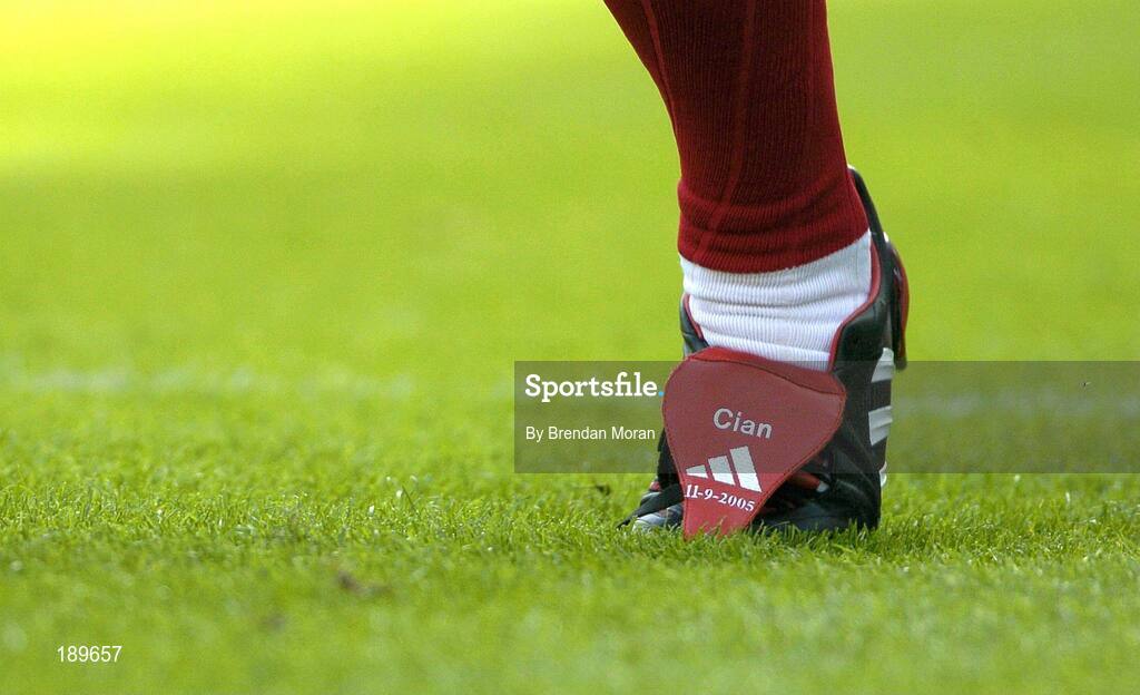 11 September 2005; Cork's Diarmuid O'Sullivan during the pre-match parade with the name of his son and the date of the game. Guinness All-Ireland Senior Hurling Championship Final, Galway v Cork, Croke Park, Dublin. Picture credit; Brendan Moran / SPORTSFILE *** Local Caption *** Any photograph taken by SPORTSFILE during, or in connection with, the 2005 Guinness All-Ireland Hurling Final which displays GAA logos or contains an image or part of an image of any GAA intellectual property, or, which contains images of a GAA player/players in their playing uniforms, may only be used for editorial and non-advertising purposes.  Use of photographs for advertising, as posters or for purchase separately is strictly prohibited unless prior written approval has been obtained from the Gaelic Athletic Association.