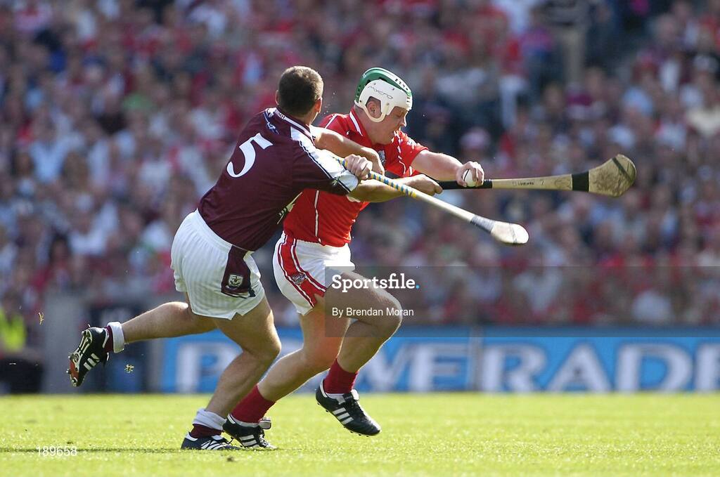 11 September 2005; Niall McCarthy, Cork, in action against Derick Hardiman, Galway. Guinness All-Ireland Senior Hurling Championship Final, Galway v Cork, Croke Park, Dublin. Picture credit; Brendan Moran / SPORTSFILE *** Local Caption *** Any photograph taken by SPORTSFILE during, or in connection with, the 2005 Guinness All-Ireland Hurling Final which displays GAA logos or contains an image or part of an image of any GAA intellectual property, or, which contains images of a GAA player/players in their playing uniforms, may only be used for editorial and non-advertising purposes.  Use of photographs for advertising, as posters or for purchase separately is strictly prohibited unless prior written approval has been obtained from the Gaelic Athletic Association.