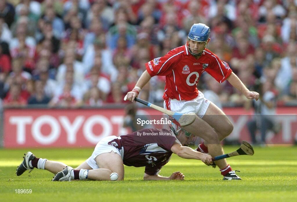 11 September 2005; Tom Kenny, Cork, in action against Fergal Healy, Galway. Guinness All-Ireland Senior Hurling Championship Final, Galway v Cork, Croke Park, Dublin. Picture credit; Brendan Moran / SPORTSFILE *** Local Caption *** Any photograph taken by SPORTSFILE during, or in connection with, the 2005 Guinness All-Ireland Hurling Final which displays GAA logos or contains an image or part of an image of any GAA intellectual property, or, which contains images of a GAA player/players in their playing uniforms, may only be used for editorial and non-advertising purposes.  Use of photographs for advertising, as posters or for purchase separately is strictly prohibited unless prior written approval has been obtained from the Gaelic Athletic Association.