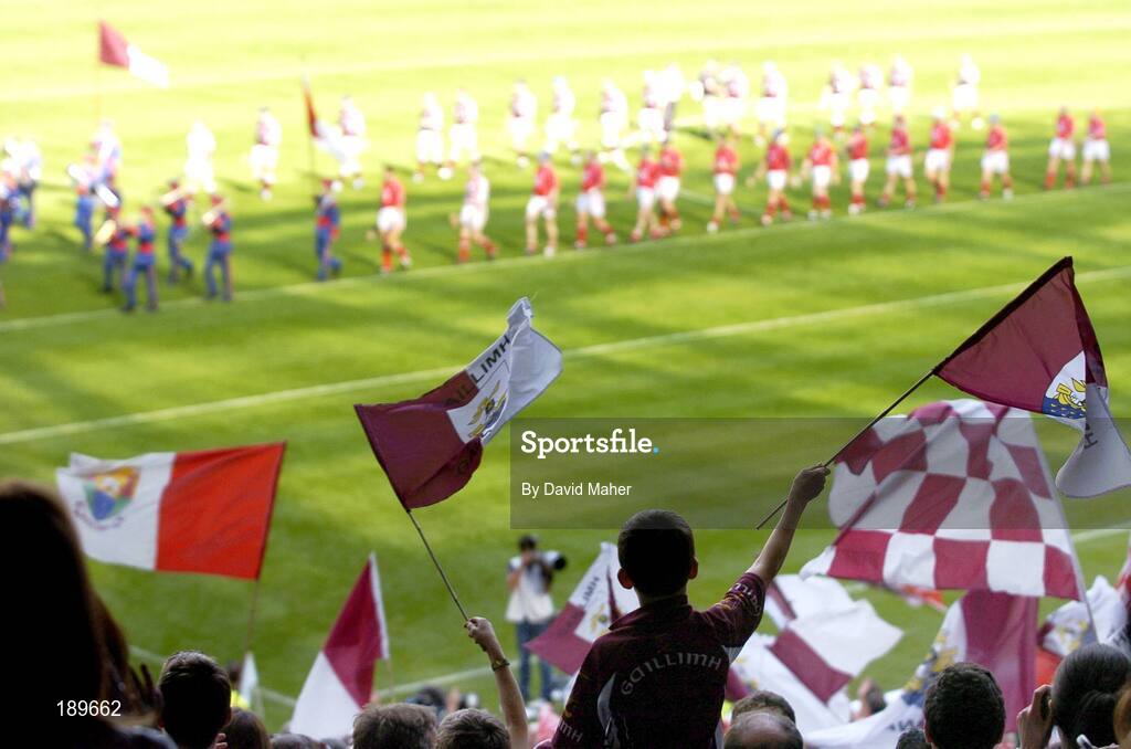 11 September 2005; Supporters cheer on their teams as they parade around Croke park before the start of the game. Guinness All-Ireland Senior Hurling Championship Final, Galway v Cork, Croke Park, Dublin. Picture credit; David Maher / SPORTSFILE *** Local Caption *** Any photograph taken by SPORTSFILE during, or in connection with, the 2005 Guinness All-Ireland Hurling Final which displays GAA logos or contains an image or part of an image of any GAA intellectual property, or, which contains images of a GAA player/players in their playing uniforms, may only be used for editorial and non-advertising purposes.  Use of photographs for advertising, as posters or for purchase separately is strictly prohibited unless prior written approval has been obtained from the Gaelic Athletic Association.