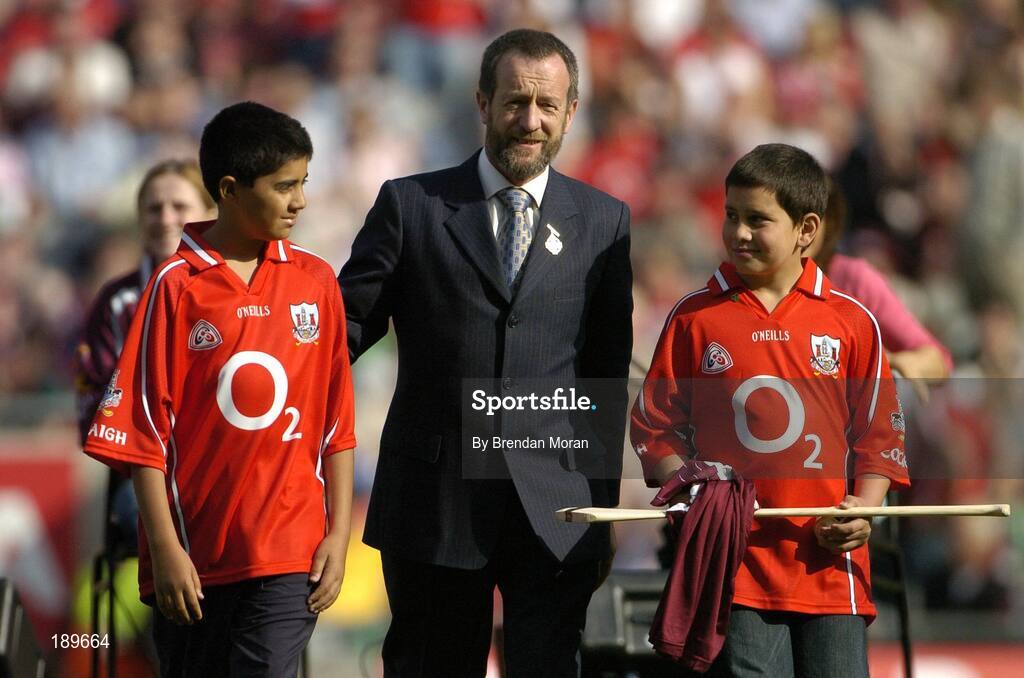 11 September 2005; GAA president Sean Kelly with Ben Healy Mahalingham, left, and Georgy Farniyev, who is a survivor of the Beslan school massacre one year ago. Guinness All-Ireland Senior Hurling Championship Final, Galway v Cork, Croke Park, Dublin. Picture credit; Brendan Moran / SPORTSFILE *** Local Caption *** Any photograph taken by SPORTSFILE during, or in connection with, the 2005 Guinness All-Ireland Hurling Final which displays GAA logos or contains an image or part of an image of any GAA intellectual property, or, which contains images of a GAA player/players in their playing uniforms, may only be used for editorial and non-advertising purposes.  Use of photographs for advertising, as posters or for purchase separately is strictly prohibited unless prior written approval has been obtained from the Gaelic Athletic Association.