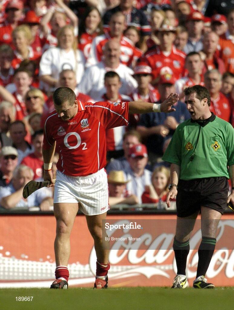 11 September 2005; Diarmuid O'Sullivan, Cork, walks away from referee Seamus Roche after conceding a free. Guinness All-Ireland Senior Hurling Championship Final, Galway v Cork, Croke Park, Dublin. Picture credit; Brendan Moran / SPORTSFILE *** Local Caption *** Any photograph taken by SPORTSFILE during, or in connection with, the 2005 Guinness All-Ireland Hurling Final which displays GAA logos or contains an image or part of an image of any GAA intellectual property, or, which contains images of a GAA player/players in their playing uniforms, may only be used for editorial and non-advertising purposes.  Use of photographs for advertising, as posters or for purchase separately is strictly prohibited unless prior written approval has been obtained from the Gaelic Athletic Association.