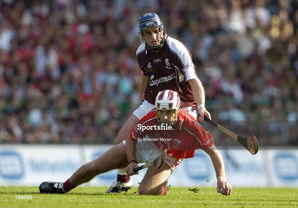11 September 2005; Ronan Curran, Cork, in action against David Forde, Galway. Guinness All-Ireland Senior Hurling Championship Final, Galway v Cork, Croke Park, Dublin. Picture credit; Brendan Moran / SPORTSFILE *** Local Caption *** Any photograph taken by SPORTSFILE during, or in connection with, the 2005 Guinness All-Ireland Hurling Final which displays GAA logos or contains an image or part of an image of any GAA intellectual property, or, which contains images of a GAA player/players in their playing uniforms, may only be used for editorial and non-advertising purposes.  Use of photographs for advertising, as posters or for purchase separately is strictly prohibited unless prior written approval has been obtained from the Gaelic Athletic Association.