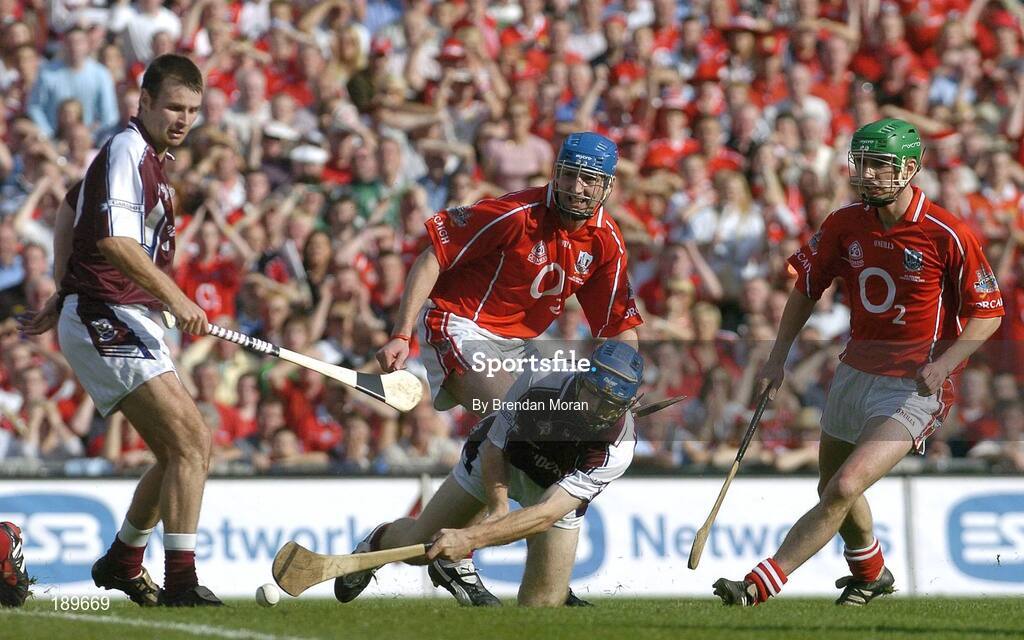 11 September 2005; Damien Hayes, Galway, watched by team-mate Richie Murray, scores his sides goal against Cork. Guinness All-Ireland Senior Hurling Championship Final, Galway v Cork, Croke Park, Dublin. Picture credit; Brendan Moran / SPORTSFILE *** Local Caption *** Any photograph taken by SPORTSFILE during, or in connection with, the 2005 Guinness All-Ireland Hurling Final which displays GAA logos or contains an image or part of an image of any GAA intellectual property, or, which contains images of a GAA player/players in their playing uniforms, may only be used for editorial and non-advertising purposes.  Use of photographs for advertising, as posters or for purchase separately is strictly prohibited unless prior written approval has been obtained from the Gaelic Athletic Association.